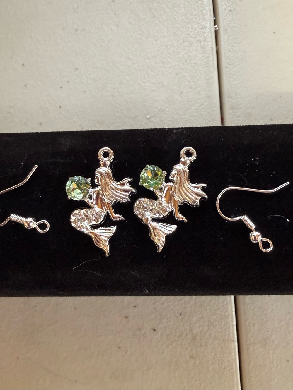 Silver Mermaid Drop Earrings with Light Green Crystal